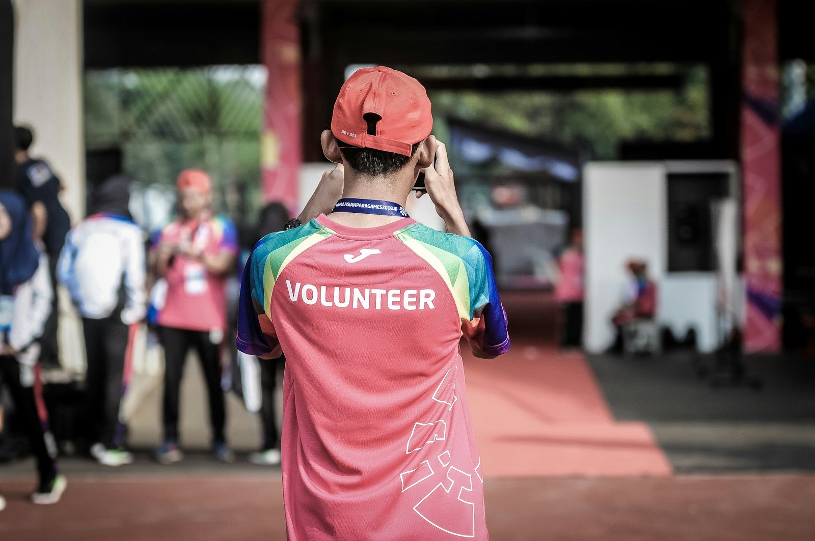 Volunteer supporting a community event